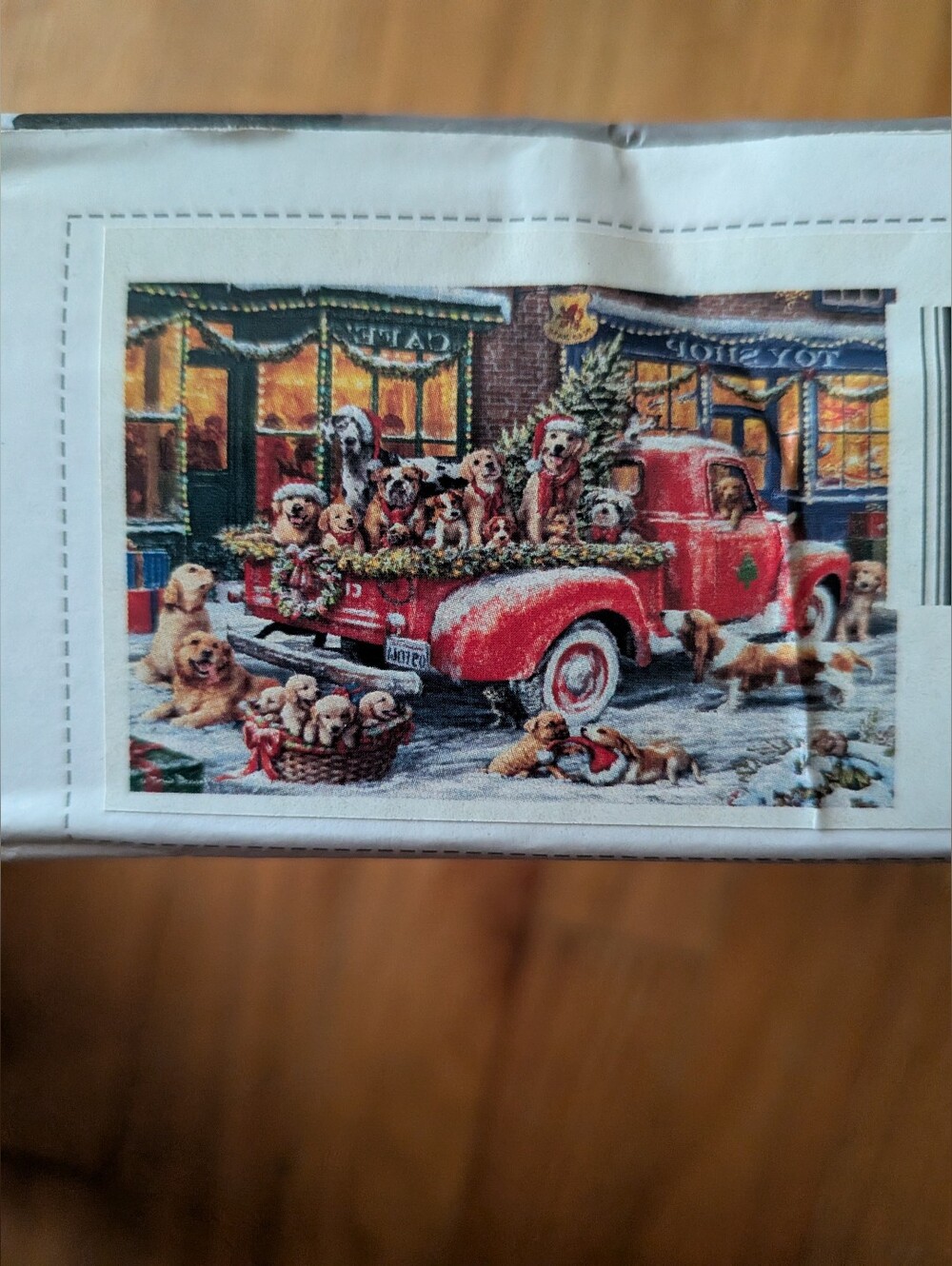 Puzzle of Christmas Dogs in Red Truck 1000 piece